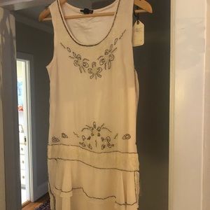 Medium flapper style ivory beaded sleeveless mini dress